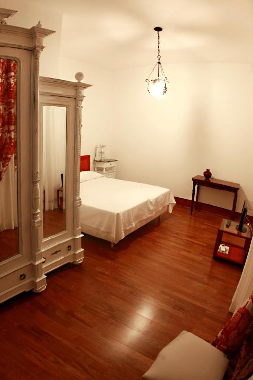 Bellezza Suites Cagliari Bilik gambar